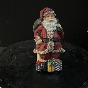 Festive Santa Claus Figurine with Gifts outlet cover